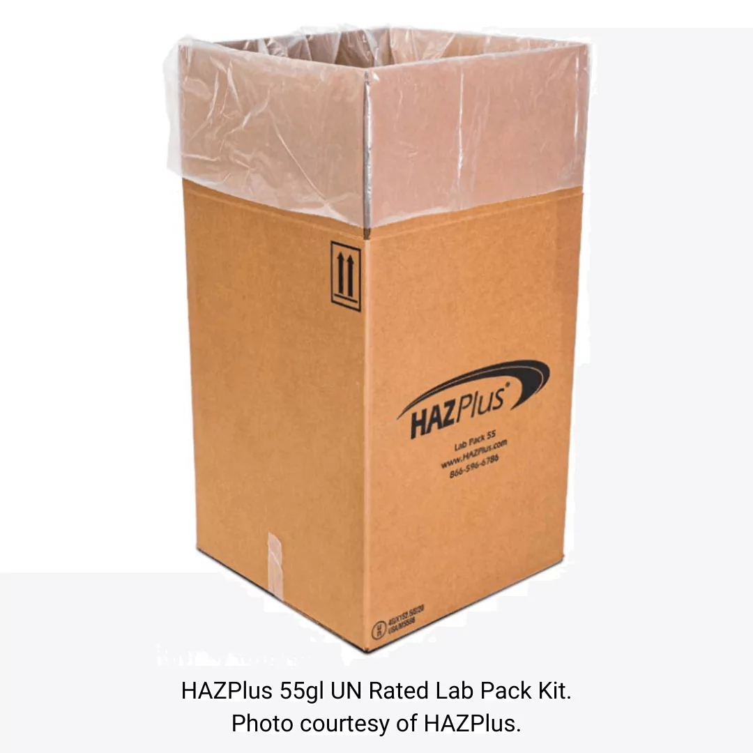 A large brown cardboard box with a clear plastic liner, labeled "HAZPlus 55gl UN Rated Lab Pack Kit" for hazardous materials is displayed. The HAZPlus logo and contact details are visible, all set against a pristine white background.