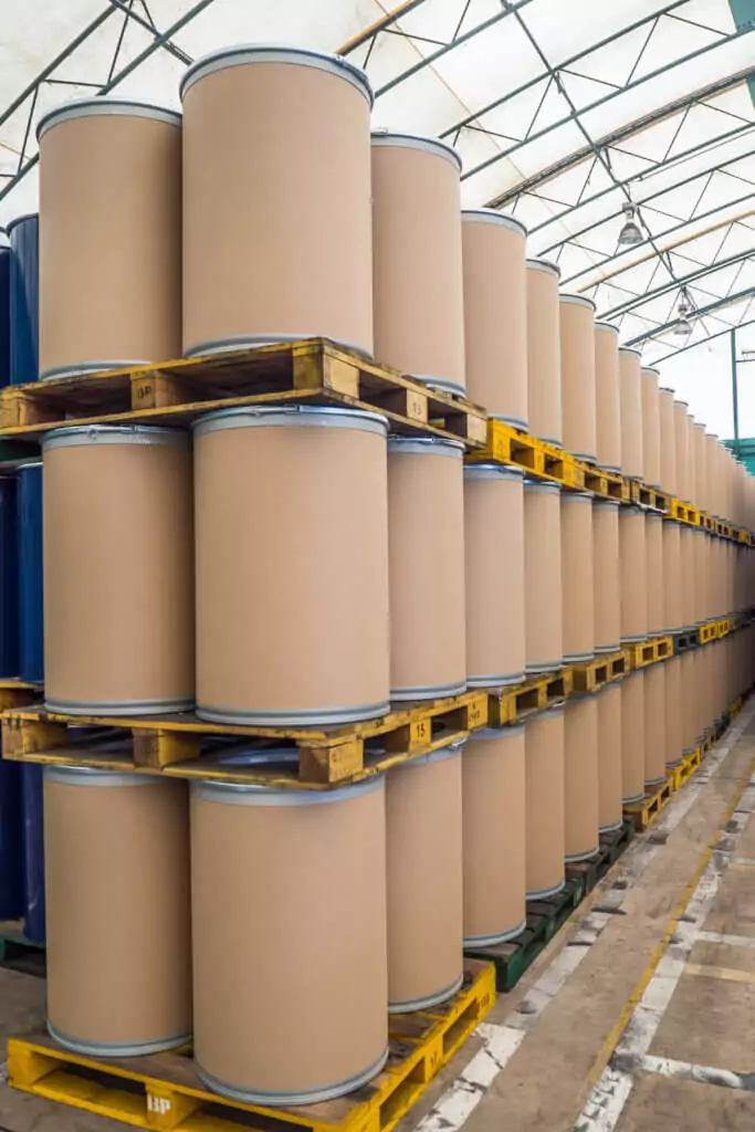 oil barrels or chemical drums stacked up, barrels made from fiber